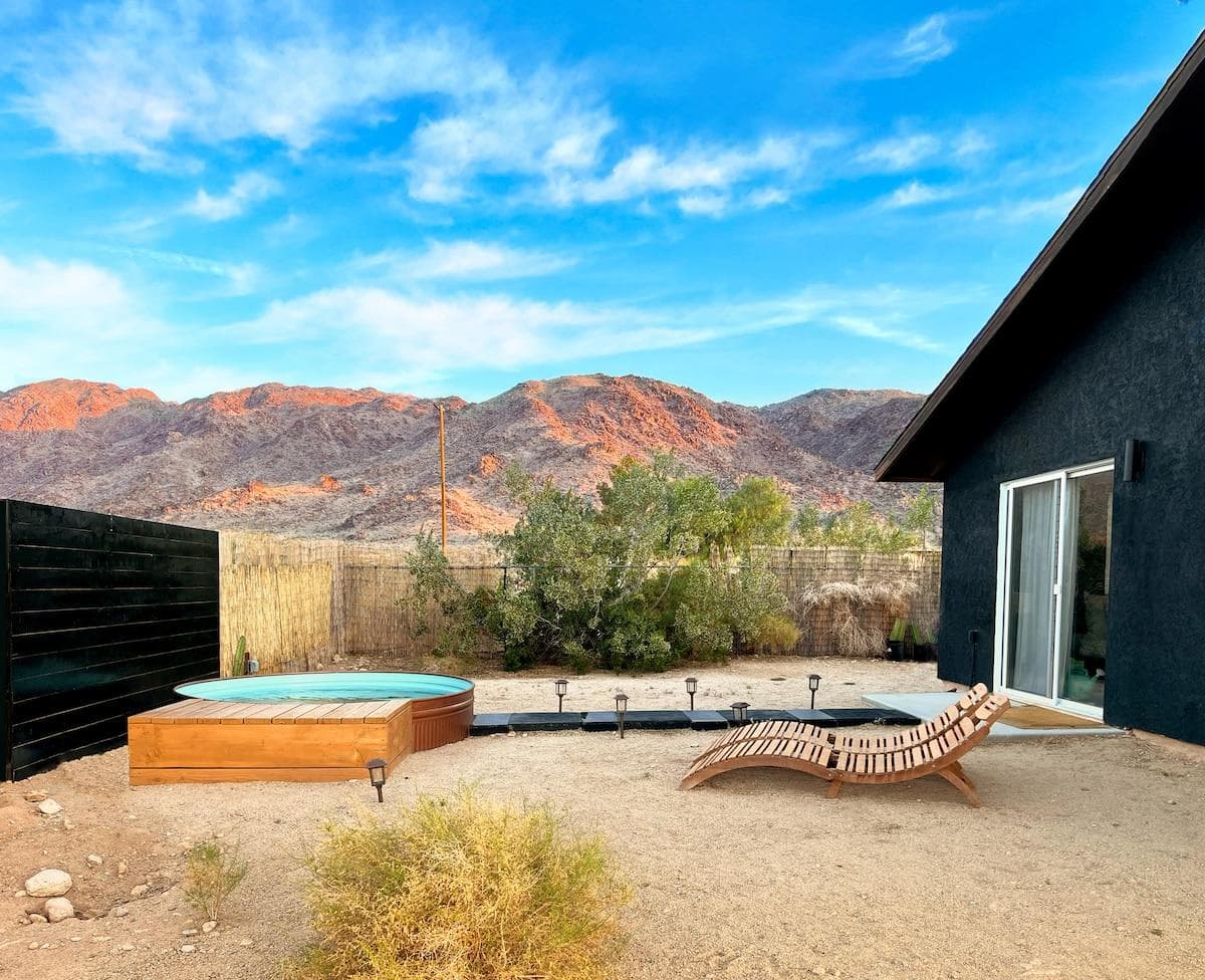 Swim, sun, and stargaze: Relax in your private 8ft cowboy pool with panoramic desert mountain views, just steps from the master bedroom.